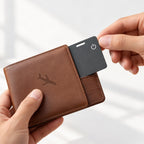 Slimfind tracker card sliding into a leather wallet card slot